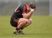 3 March 2013; A dejected Paul McComiskey, Down, at the end of the game. Allianz Football League, Division 1, Down v Cork, Pairc Esler, Newry, Co. Down. Photo by Sportsfile