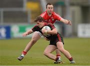 3 March 2013; Paul McComiskey, Down, in action against Paul Kerrigan, Cork. Allianz Football League, Division 1, Down v Cork, Pairc Esler, Newry, Co. Down. Photo by Sportsfile