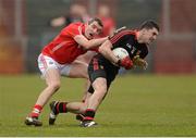 3 March 2013; Keith Quinn, Down, in action against Graham Canty, Cork. Allianz Football League, Division 1, Down v Cork, Pairc Esler, Newry, Co. Down. Photo by Sportsfile