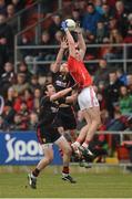 3 March 2013; Kevin McKernan, Down, in action against Aidan Walsh, left, and Thomas Clancy, Cork. Allianz Football League, Division 1, Down v Cork, Pairc Esler, Newry, Co. Down. Photo by Sportsfile