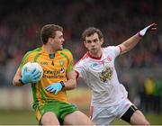 3 March 2013; Eamonn McGee, Donegal, in action against Ronan McNamee, Tyrone. Allianz Football League, Division 1, Tyrone v Donegal, Healy Park, Omagh, Co. Tyrone. Picture credit: Oliver McVeigh / SPORTSFILE
