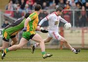 3 March 2013; Stephen O'Neill, Tyrone, goes past Paul Durcan and Neil McGee to score his sides goal, Donegal. Allianz Football League, Division 1, Tyrone v Donegal, Healy Park, Omagh, Co. Tyrone. Picture credit: Oliver McVeigh / SPORTSFILE