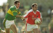 6 April 2003; Aidan O'Rourke, Armagh, in action against Eoin Brosnan, Kerry. Allianz National Football League, Division 1A, Kerry v Armagh, Austin Stack Park, Tralee, Co. Kerry. Football. Picture credit; Brendan Moran / SPORTSFILE *EDI*