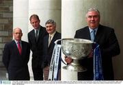 7 May 2003; Armagh manager Joe Kernan holds the Sam Maguire Cup as Roscommon manager Tommy Carr, left, Tipperary manager Tom McGlinchey, centre and Mick O'Dwyer, Laois manager, right, watch on at the photocall to celebrate 10 years of the Bank of Ireland's sponsorship of the All-Ireland Football Championship. House of Lords, Bank of Ireland, College Green, Dublin. Football. Picture credit; David Maher / SPORTSFILE