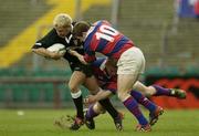10 May 2003; Paddy Wallace, Ballymena, is tackled by Andy Dunne (10), and Simon O'Donnell, Clontarf. AIB League Division 1 Final, Clontarf v Ballymena, Lansdowne Road, Dublin. Picture credit; Brendan Moran / SPORTSFILE *EDI*