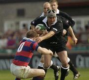 10 May 2003; Matthew Waterhouse, Ballymena, is tackled by Clontarf's Andy Dunne. AIB League Division 1 Final, Clontarf v Ballymena, Lansdowne Road, Dublin. Picture credit; Pat Murphy / SPORTSFILE *EDI*