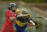 11 May 2003; Joanne Ryan, Tipperary, in action against Gemma O'Connor, Cork. National Camogie League Final, Cork v Tipperary, Pairc Ui Rinn, Cork. Picture credit; Brendan Moran / SPORTSFILE *EDI*