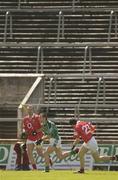 11 May 2003; Stephen Lavin, Limerick, in action against Cork's Maurice McCarthy (23) and Colin Corkery in front of an empty terrace. Bank of Ireland Munster Senior Football Championship, Cork v Limerick, Pairc Ui Chaoimh, Cork. Picture credit; Brendan Moran / SPORTSFILE *EDI*