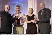 2 May 2003; Tony Hehir, University of Limerick, 2nd from left, is presented with the Women's Coach of the Year by Dermot Byrne, Commercial manager, ESB , left, and Michelle Aspell, University of Limerick, is presented with the Senior Women's Player of the Year by Tony Colgan, President of the IBA, at the Irish Basketball Annual Awards at the Burlington Hotel, Dublin. Picture credit; Brendan Moran / SPORTSFILE *EDI*