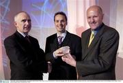 2 May 2003; Adrian Fulton, SX3 Star, is presented with the Senior Men's of the Year by Dermot Byrne, Commercial manager, ESB , left, and Tony Colgan, President of the IBA, at the Irish Basketball Annual Awards at the Burlington Hotel, Dublin. Picture credit; Brendan Moran / SPORTSFILE *EDI*