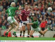 4 May 2003; Martin Flanagan, Westmeath, in action against Limerick's Jason Stokes, right, and Diarmuid Sheehy. Allianz National Football League Division 2 Final, Westmeath v Limerick, Croke Park, Dublin. Football. Picture credit; Ray McManus / SPORTSFILE