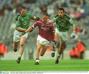 4 May 2003; Martin Flanagan, Westmeath, in action against Limerick's Brian Begley, left, and John Galvin. Allianz National Football League Division 2 Final, Westmeath v Limerick, Croke Park, Dublin. Football. Picture credit; Ray McManus / SPORTSFILE