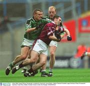 4 May 2003; Fergal Wilson, Westmeath, is tackled by Limerisck's Jason Stokes. Allianz National Football League Division 2 Final, Westmeath v Limerick, Croke Park, Dublin. Football. Picture credit; Pat Murphy / SPORTSFILE