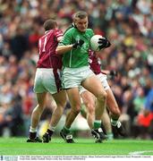4 May 2003; Jason Stokes, Limerick, is tackled by Westmeath's Shane Colleary. Allianz National Football League Division 2 Final, Westmeath v Limerick, Croke Park, Dublin. Football. Picture credit; Ray McManus / SPORTSFILE
