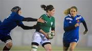 8 March 2013; Nora Stapleton, Ireland, is tackled by Sandra Rabier, left, and Marjorie Mayans, France. Women's Six Nations Rugby Championship, Ireland v France, Ashbourne RFC, Ashbourne, Co. Meath. Picture credit: Brendan Moran / SPORTSFILE