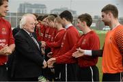 6 March 2013; President of Ireland Michael D Higgins, meets player of  IT Carlow before the start of the game. CFAI UMBRO Cup Final. IT Carlow v Waterford IT. Tallaght Stadium, Talllaght, Dublin. Picture credit: David Maher / SPORTSFILE