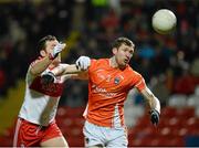9 March 2013; Emmett McGuckin, Derry, in action against James Donnelly, Armagh. Allianz Football League, Division 2, Derry v Armagh, Celtic Park, Derry. Picture credit: Oliver McVeigh / SPORTSFILE