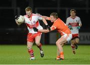 9 March 2013; Enda Lynn, Derry, in action against Declan McKenna, Armagh. Allianz Football League, Division 2, Derry v Armagh, Celtic Park, Derry. Picture credit: Oliver McVeigh / SPORTSFILE