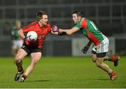 9 March 2013; Mark Poland, Down, in action against Cathal Carolan, Mayo. Allianz Football League, Division 1, Down v Mayo, Páirc Esler, Newry, Co. Down. Picture credit: Barry Cregg / SPORTSFILE