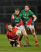 9 March 2013; Conor Laverty, Down, in action against Lee Keegan, centre, and Jason Doherty, right, Mayo. Allianz Football League, Division 1, Down v Mayo, Páirc Esler, Newry, Co. Down. Picture credit: Barry Cregg / SPORTSFILE