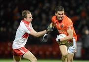 9 March 2013; Stephen Harold, Armagh, in action against Sean Leo McGoldrick, Derry. Allianz Football League, Division 2, Derry v Armagh, Celtic Park, Derry. Picture credit: Oliver McVeigh / SPORTSFILE