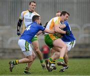 10 March 2013; Leo McLoone, Donegal, in action against Shane Enright and Darren O'Sullivan, Kerry. Allianz Football League, Division 1, Donegal v Kerry, Páirc MacCumhaill, Ballybofey, Co. Donegal. Picture credit: Oliver McVeigh / SPORTSFILE