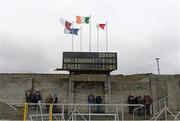 10 March 2013; Supporters shelter from the wind at half-time as Laois lead Westmeath 1-6 to 1-3. Allianz Football League, Division 2, Westmeath v Laois, Cusack Park, Mullingar, Co. Westmeath. Picture credit: Brendan Moran / SPORTSFILE