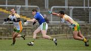 10 March 2013; James O'Donoghue, Kerry, in action against Neil McGee and Frank McGlynn, Donegal. Allianz Football League, Division 1, Donegal v Kerry, Páirc MacCumhaill, Ballybofey, Co. Donegal. Picture credit: Oliver McVeigh / SPORTSFILE