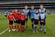 10 March 2013; Craig Fannin, Jack Roche, Ethan Keogh, Fíona Gallagher, Donal Gallagher and Oisín Murray with Dublin stars Paul Flynn, Bernard Brogan and Diarmuid Connolly before the game. Allianz Football League, Division 1, Kildare v Dublin, Croke Park, Dublin. Picture credit: Ray McManus / SPORTSFILE