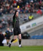 10 March 2013; Referee Joe McQuillan issues a 'Yellow Card'. Allianz Football League, Division 1, Kildare v Dublin, Croke Park, Dublin. Picture credit: Ray McManus / SPORTSFILE