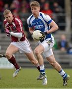 10 March 2013; Denis Booth, Laois, in action against Denis Glennon, Westmeath. Allianz Football League, Division 2, Westmeath v Laois, Cusack Park, Mullingar, Co. Westmeath. Picture credit: Brendan Moran / SPORTSFILE