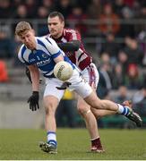 10 March 2013; Denis Booth, Laois, in action against David Duffy, Westmeath. Allianz Football League, Division 2, Westmeath v Laois, Cusack Park, Mullingar, Co. Westmeath. Picture credit: Brendan Moran / SPORTSFILE