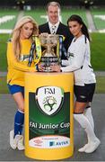 11 March 2013; At a photocall in advance of the quarter-finals of the FAI Junior Cup with Aviva and Umbro on Saturday 23rd and Sunday 24th of March is Kenny Cunningham, FAI Junior Cup Ambassador with models Nicola Hughes, left, and Adrienne Murphy. Photocall ahead of FAI Junior Cup Quarter-Final with Aviva and Umbro, Aviva Stadium, Lansdowne Road, Dublin. Picture credit: Brendan Moran / SPORTSFILE