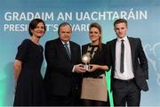 15 March 2013; The Ó Sé Family, of Ceann Trá, Co. Chiarraí, from left, Marie Uí Sé, wife of the late Páidí Ó Sé, with her children Siún Ní Sé and Pádraig Óg Ó Sé, are presented with their GAA President's Award for 2013 by Uachtarán Chumann Lúthchleas Gael Liam Ó Néill. The Ó Sé Family have made an incalculable contribution to Gaelic football and by extension the GAA over a prolonged period that stretches across two generations and five decades. The late Páidí Ó Sé is considered to be one of the greatest footballers of all time, winning eight All-Ireland medals, numerous All-Stars and almost every honour the game has to offer. His nephews Fergal, Darragh, Tomás and Marc have represented between them both An Ghaeltacht and Kerry with distinction claiming county, provincial and national honours with the latter two still members of the Kerry senior football team. Páidí’s son Pádraig Óg is a current member of the Kerry U21 panel managed by Darragh. GAA President's Awards 2013, Croke Park, Dublin. Picture credit: Brian Lawless / SPORTSFILE
