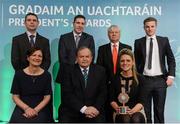 15 March 2013; Uachtarán Chumann Lúthchleas Gael Liam Ó Néill, with members of the Ó Sé Family, of Ceann Trá, Co. Chiarraí, Marie Uí Sé, wife of the late Páidí Ó Sé, left, and her daughter Siún Ní Sé, with back row, from left, Fergal Ó Sé, nephew, Darragh Ó Sé, nephew, Tomas Ó Sé, brother of the late Páidí Ó Sé, and Pádrai Óg Ó Sé, son of the late Páidí Ó Sé, after they were presented with their GAA President's Award for 2013. The Ó Sé Family have made an incalculable contribution to Gaelic football and by extension the GAA over a prolonged period that stretches across two generations and five decades. The late Páidí Ó Sé is considered to be one of the greatest footballers of all time, winning eight All-Ireland medals, numerous All-Stars and almost every honour the game has to offer. His nephews Fergal, Darragh, Tomás and Marc have represented between them both An Ghaeltacht and Kerry with distinction claiming county, provincial and national honours with the latter two still members of the Kerry senior football team. Páidí’s son Pádraig Óg is a current member of the Kerry U21 panel managed by Darragh. GAA President's Awards 2013, Croke Park, Dublin. Picture credit: Brian Lawless / SPORTSFILE