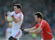 10 March 2013; Kyle Coney, Tyrone, in action against Jamie O'Sullivan, Cork. Allianz Football League, Division 1, Tyrone v Cork, Healy Park, Omagh, Co. Tyrone. Picture credit: Brian Lawless / SPORTSFILE