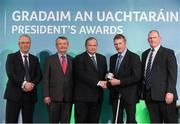 15 March 2013; Michael Mulhare is presented with his GAA President's Awards for 2013 award by Uachtarán Chumann Lúthchleas Gael Liam Ó Néill in the company of Neil Hosty, AIB, left, Pól Ó Gallchóir, Ceannaái TG4, and his brother Joe Mulhare, right. Mick has been one of the most influential members of Stradbally GAC since its foundation. After finishing up his playing career, he became club secretary in 1975 before stepping up to Chairman in 1988. Mick had an instrumental role in the changing of the clubs grounds from Cosby Hall in ’93 to Bill Delaney Park and this has been credited with being the main reason for the subsequent three county championship successes for Stradbally in 1997, 1998 and 2005. GAA President's Awards 2013, Croke Park, Dublin. Picture credit: Brian Lawless / SPORTSFILE