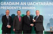 15 March 2013; Peter Rice is presented with his GAA President's Awards for 2013 award by Uachtarán Chumann Lúthchleas Gael Liam Ó Néill in the company of Neil Hosty, AIB, left, and Pól Ó Gallchóir, Ceannaái TG4. A native of Laois and now residing in Wexford, Peter has dedicated over 30 years to the promotion and development of ladies football at local, county and national level. Peter has held many posts throughout all sections of the Association, including National President from ’91 to ‘94 and is currently National Treasurer. GAA President's Awards 2013, Croke Park, Dublin. Picture credit: Brian Lawless / SPORTSFILE