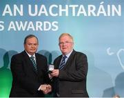 15 March 2013; Peter Rice is presented with his GAA President's Awards for 2013 award by Uachtarán Chumann Lúthchleas Gael Liam Ó Néill. A native of Laois and now residing in Wexford, Peter has dedicated over 30 years to the promotion and development of ladies football at local, county and national level. Peter has held many posts throughout all sections of the Association, including National President from ’91 to ‘94 and is currently National Treasurer. GAA President's Awards 2013, Croke Park, Dublin. Picture credit: Brian Lawless / SPORTSFILE
