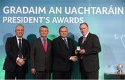 15 March 2013; PJ Hughes is presented with his GAA President's Awards for 2013 award by Uachtarán Chumann Lúthchleas Gael Liam Ó Néill in the company of Neil Hosty, AIB, left, and Pól Ó Gallchóir, Ceannaái TG4. A Crossmolina man through and through, PJ has been an integral part of the club successes over the last 40 years. Having worked as the club’s PRO every year without fail, he’s also been the club’s unofficial photographer and annually compiles a club list of appearances and scores of every team from U-6 to senior. Without doubt, the epitome of what it is to be a great clubman. GAA President's Awards 2013, Croke Park, Dublin. Picture credit: Brian Lawless / SPORTSFILE