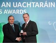 15 March 2013; PJ Hughes is presented with his GAA President's Awards for 2013 award by Uachtarán Chumann Lúthchleas Gael Liam Ó Néill. A Crossmolina man through and through, PJ has been an integral part of the club successes over the last 40 years. Having worked as the club’s PRO every year without fail, he’s also been the club’s unofficial photographer and annually compiles a club list of appearances and scores of every team from U-6 to senior. Without doubt, the epitome of what it is to be a great clubman. GAA President's Awards 2013, Croke Park, Dublin. Picture credit: Brian Lawless / SPORTSFILE