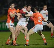 16 March 2013; Shane Lennon, Louth, in action against Brendan Donaghy and James Morgan, right, Armagh. Allianz Football League, Division 2, Armagh v Louth, Athletic Grounds, Armagh. Picture credit: Oliver McVeigh / SPORTSFILE