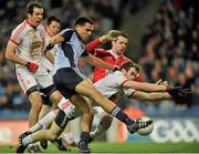 16 March 2013; Craig Dias, Dublin, has his shot blocked by, from left, Justin McMahon, Niall Morgan and Ronan McNamee, Tyrone. Allianz Football League, Division 1, Dublin v Tyrone, Croke Park, Dublin. Picture credit: Pat Murphy / SPORTSFILE