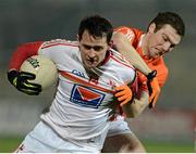 16 March 2013; Shane Lennon, Louth, in action against Brendan Donaghy, Armagh. Allianz Football League, Division 2, Armagh v Louth, Athletic Grounds, Armagh. Picture credit: Oliver McVeigh / SPORTSFILE