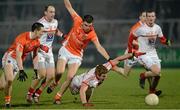 16 March 2013; Kevin Rodgers, Louth, supported by team mate Darren Clarke, in action against James Morgan and Stephen Harold, Armagh. Allianz Football League, Division 2, Armagh v Louth, Athletic Grounds, Armagh. Picture credit: Oliver McVeigh / SPORTSFILE