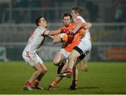 16 March 2013; Johnny Hanratty, Armagh, in action against Andy McDonnell and Ronan Carroll, right, Louth. Allianz Football League, Division 2, Armagh v Louth, Athletic Grounds, Armagh. Picture credit: Oliver McVeigh / SPORTSFILE