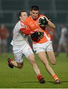 16 March 2013; Stephen Harold, Armagh, in action against Mark Brennan, Louth. Allianz Football League, Division 2, Armagh v Louth, Athletic Grounds, Armagh. Picture credit: Oliver McVeigh / SPORTSFILE