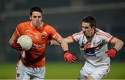 16 March 2013; Gavin McPartland, Armagh, in action against Padraig Rath, Louth. Allianz Football League, Division 2, Armagh v Louth, Athletic Grounds, Armagh. Picture credit: Oliver McVeigh / SPORTSFILE