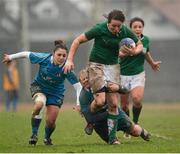 17 March 2013; Niamh Kavanagh, Ireland, is tackled by Michela Este, left, and Veronica Schiavon, Italy. Women's 6 Nations Rugby Championship, Italy v Ireland, Parabiago, Milan, Italy. Picture credit: Matt Browne / SPORTSFILE