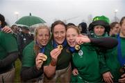 17 March 2013; Ireland's Stacey-Lea Kennedy, left, Ailis Egan and Fiona Hayes, right, celebrate after the final whistle. Women's 6 Nations Rugby Championship, Italy v Ireland, Parabiago, Milan, Italy. Picture credit: Matt Browne / SPORTSFILE
